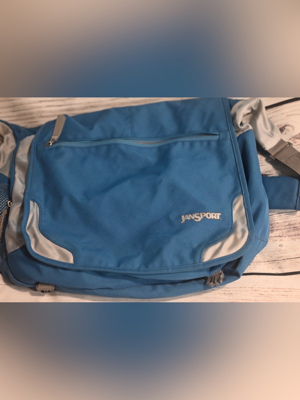 Jansport Sky Blue Messenger Bag with Light Gray Accents